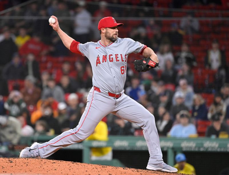 Apr 12, 2024; Boston, Massachusetts, USA; Los Angeles Angels relief pitcher Hunter Strickland (61) pitches against the Boston Red Sox during the ninth inning at Fenway Park. Mandatory Credit: Eric Canha-USA TODAY Sports