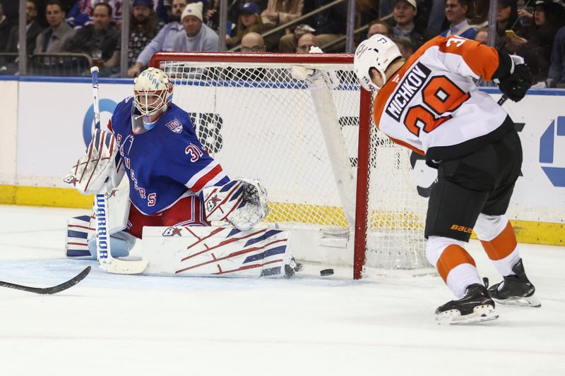 Feb 26, 2026; New York, New York, USA;  Philadelphia Flyers right wing Matvei Michkov (39) shoots the puck past New York Rangers goaltender Igor Shesterkin (31) for a goal in the second period at Madison Square Garden. Mandatory Credit: Wendell Cruz-Imagn Images