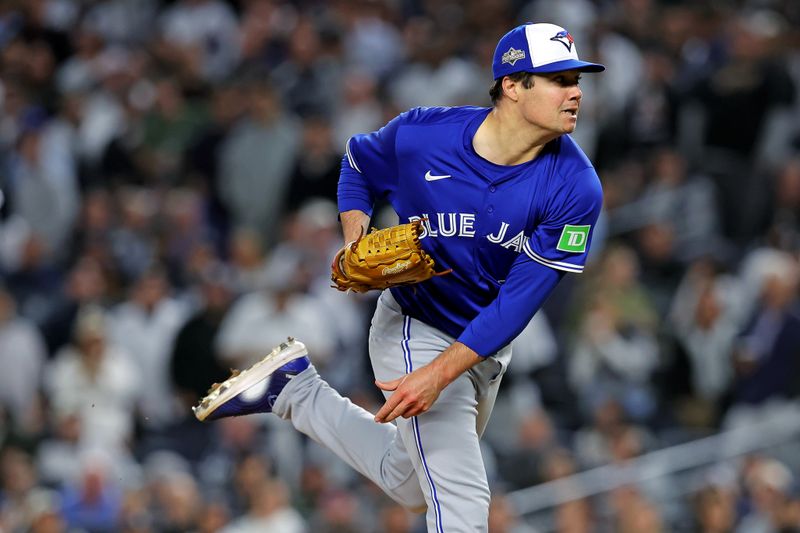 Oct 8, 2025; Bronx, New York, USA; Toronto Blue Jays pitcher Brendon Little (54) pitches during the seventh inning against the New York Yankees during game four of the ALDS round for the 2025 MLB playoffs at Yankee Stadium. Mandatory Credit: Brad Penner-Imagn Images