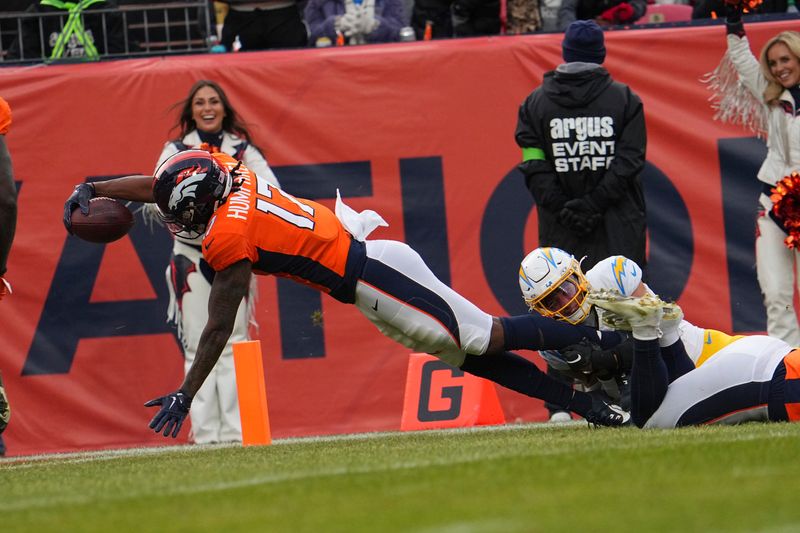 Denver Broncos wide receiver Lil'Jordan Humphrey (17) scores a touch down against the Los Angeles Chargers of an NFL football game Sunday December 31, 2023, in Denver. (AP Photo/Bart Young)