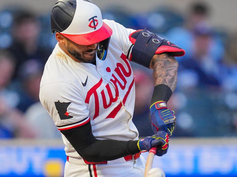 May 28, 2024; Minneapolis, Minnesota, USA; Minnesota Twins shortstop Carlos Correa (4) pops out against the Kansas City Royals in the seventh inning at Target Field. Mandatory Credit: Brad Rempel-USA TODAY Sports