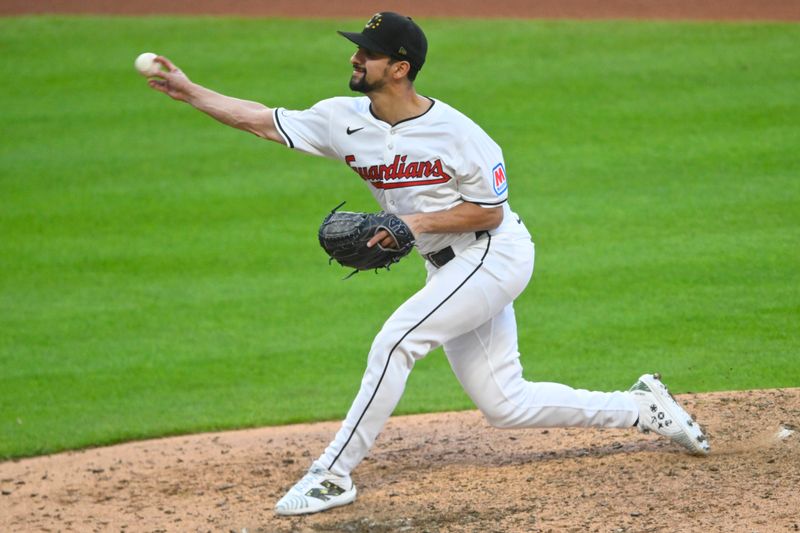 May 18, 2024; Cleveland, Ohio, USA; Cleveland Guardians relief pitcher Nick Sandlin (52) delivers a pitch in the seventh inning against the Minnesota Twins at Progressive Field. Mandatory Credit: David Richard-USA TODAY Sports