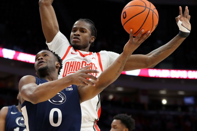 Jan 20, 2024; Columbus, Ohio, USA;  Penn State Nittany Lions guard Kanye Clary (0) controls the basketball as Ohio State Buckeyes center Felix Okpara (34) defends during the first half at Value City Arena. Mandatory Credit: Joseph Maiorana-USA TODAY Sports