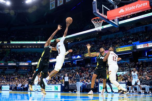 INDIANAPOLIS, INDIANA - NOVEMBER 03: Darius Garland #10 of the Cleveland Cavaliers takes a shot while defended by Myles Turner #33 of the Indiana Pacers during the first half during the NBA In-Season Tournament at Gainbridge Fieldhouse on November 03, 2023 in Indianapolis, Indiana. NOTE TO USER: User expressly acknowledges and agrees that, by downloading and or using this photograph, User is consenting to the terms and conditions of the Getty Images License Agreement.  (Photo by Justin Casterline/Getty Images)