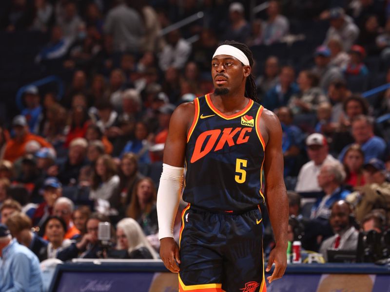 OKLAHOMA CITY, OK - FEBRUARY 4:  Luguentz Dort #5 of the Oklahoma City Thunder looks on during the game on February 4, 2024 at Paycom Arena in Oklahoma City, Oklahoma. NOTE TO USER: User expressly acknowledges and agrees that, by downloading and or using this photograph, User is consenting to the terms and conditions of the Getty Images License Agreement. Mandatory Copyright Notice: Copyright 2024 NBAE (Photo by Zach Beeker/NBAE via Getty Images)