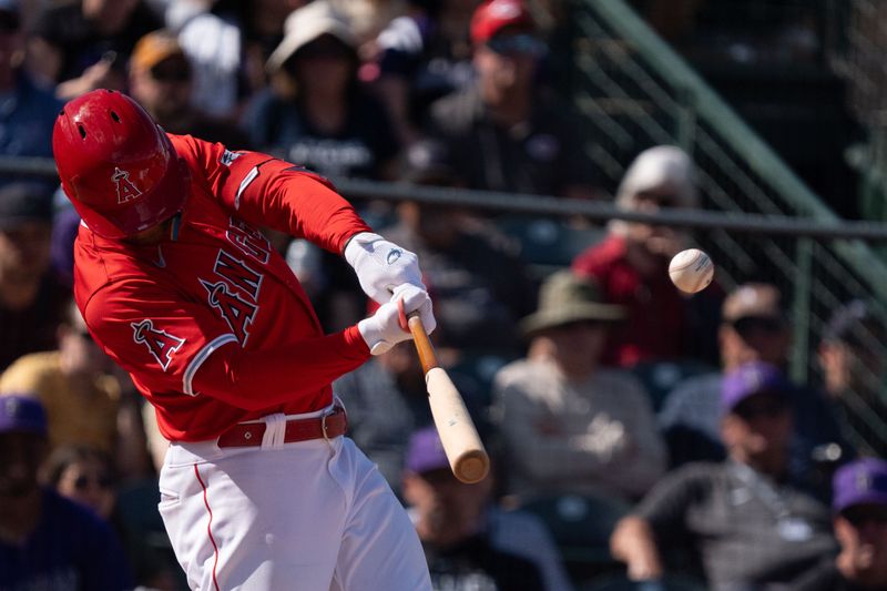 Mar 8, 2024; Tempe, Arizona, USA; Los Angeles Angels outfielder Taylor Ward (3) doubles in the fifth during a spring training game against the Colorado Rockies at Tempe Diablo Stadium. Mandatory Credit: Allan Henry-USA TODAY Sports