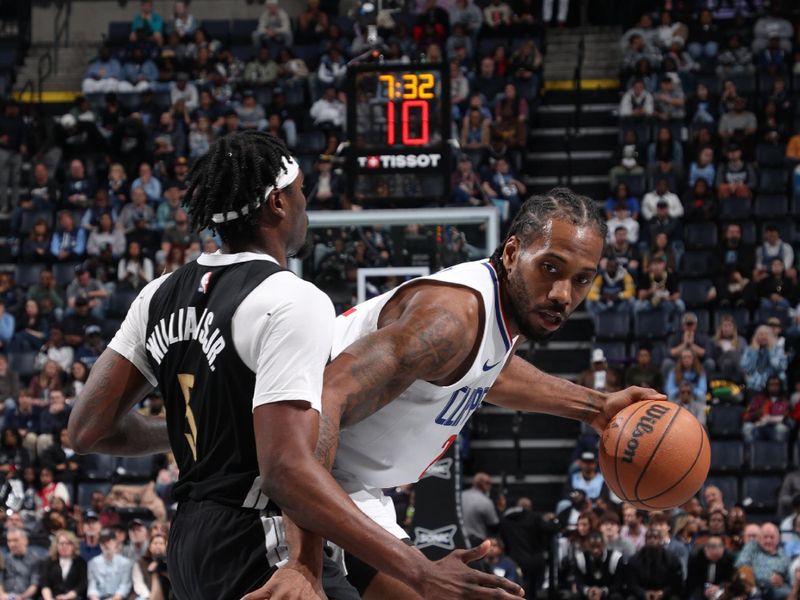 MEMPHIS, TN - FEBRUARY 23: Kawhi Leonard #2 of the LA Clippers dribbles the ball during the game against the Memphis Grizzlies on February 23, 2024 at FedExForum in Memphis, Tennessee. NOTE TO USER: User expressly acknowledges and agrees that, by downloading and or using this photograph, User is consenting to the terms and conditions of the Getty Images License Agreement. Mandatory Copyright Notice: Copyright 2024 NBAE (Photo by Joe Murphy/NBAE via Getty Images)