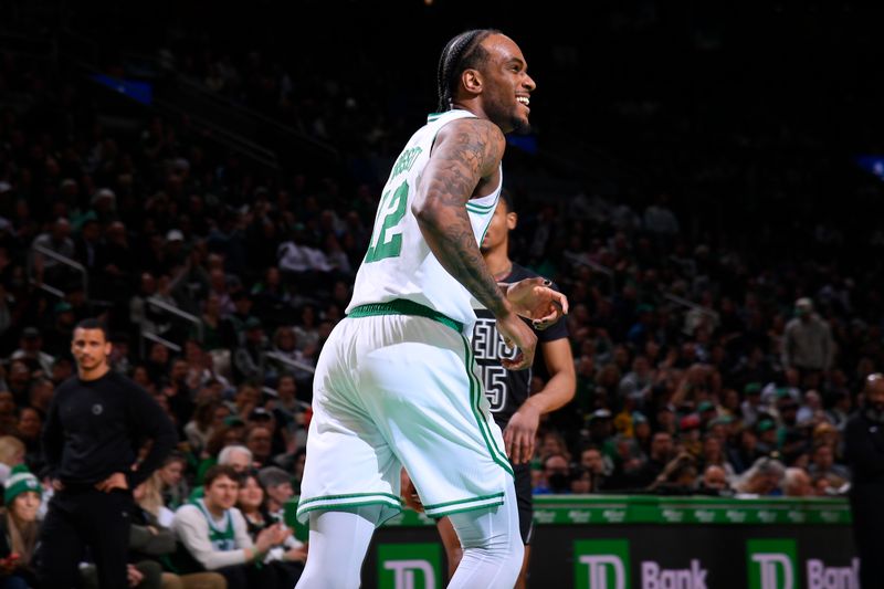 BOSTON, MA - FEBRUARY 14: Oshae Brissett #12 of the Boston Celtics smiles during the game against the Brooklyn Nets on February 14, 2024 at the TD Garden in Boston, Massachusetts. NOTE TO USER: User expressly acknowledges and agrees that, by downloading and or using this photograph, User is consenting to the terms and conditions of the Getty Images License Agreement. Mandatory Copyright Notice: Copyright 2024 NBAE  (Photo by Brian Babineau/NBAE via Getty Images)