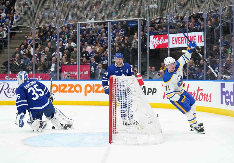 Mar 6, 2024; Toronto, Ontario, CAN; Buffalo Sabres left wing Victor Olofsson (71) celebrates scoring a goal on Toronto Maple Leafs goaltender Ilya Samsonov (35) during the second period at Scotiabank Arena. Mandatory Credit: Nick Turchiaro-USA TODAY Sports