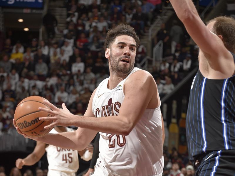 CLEVELAND, OH - APRIL 20: Georges Niang #20 of the Cleveland Cavaliers drives to the basket during Round 1 Game 1 of the 2024 NBA Playoffs against the Orlando Magic on April 20, 2024 at Rocket Mortgage FieldHouse in Cleveland, Ohio. NOTE TO USER: User expressly acknowledges and agrees that, by downloading and/or using this Photograph, user is consenting to the terms and conditions of the Getty Images License Agreement. Mandatory Copyright Notice: Copyright 2024 NBAE (Photo by David Liam Kyle/NBAE via Getty Images)