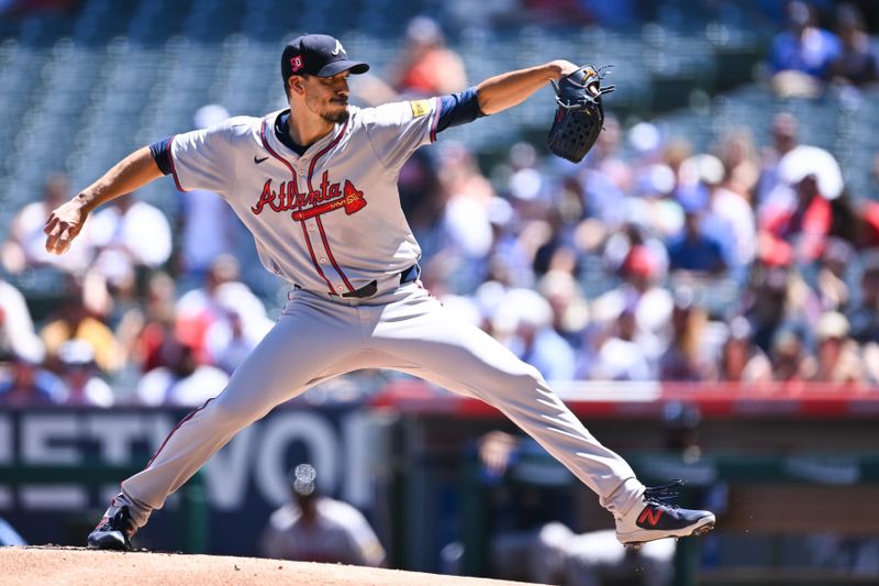 Aug 18, 2024; Anaheim, California, USA; Atlanta Braves pitcher Charlie Morton (50) throws a pitch against the Los Angeles Angels during the first inning at Angel Stadium. Mandatory Credit: Jonathan Hui-USA TODAY Sports