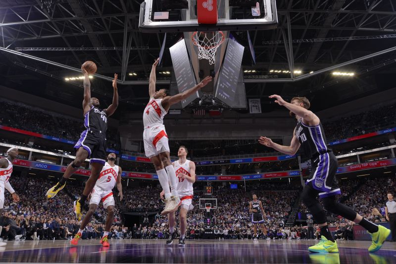 SACRAMENTO, CA - JANUARY 5: Trey Lyles #41 of the Sacramento Kings shoots the ball during the game against the Toronto Raptors on January 5, 2024 at Golden 1 Center in Sacramento, California. NOTE TO USER: User expressly acknowledges and agrees that, by downloading and or using this Photograph, user is consenting to the terms and conditions of the Getty Images License Agreement. Mandatory Copyright Notice: Copyright 2024 NBAE (Photo by Rocky Widner/NBAE via Getty Images)