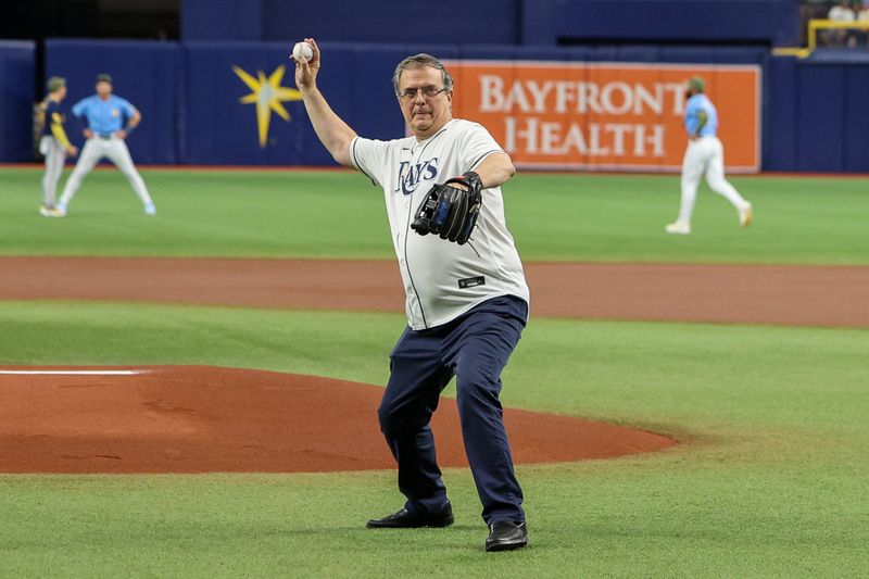 May 21, 2023; St. Petersburg, Florida, USA;  Mexico   s Secretary Marcelo Ebrard throws out the first pitch before game between the Milwaukee Brewers and Tampa Bay Rays at Tropicana Field. Mandatory Credit: Nathan Ray Seebeck-USA TODAY Sports