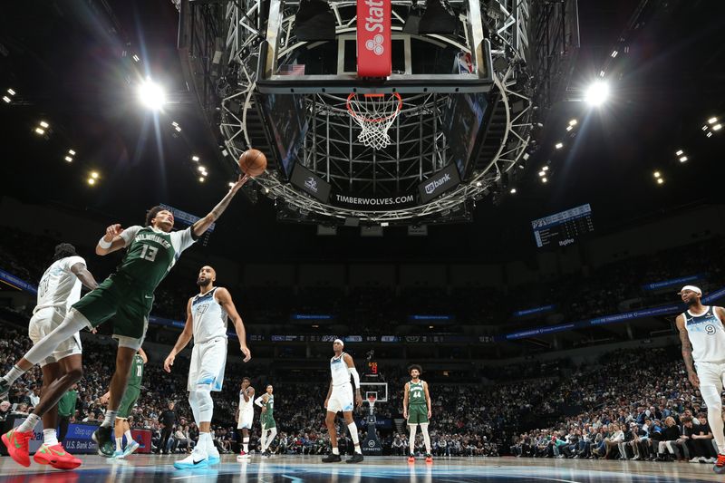 MINNEAPOLIS, MN -  FEBRUARY 12: Ryan Rollins #13 of the Milwaukee Bucks drives to the basket during the game against the Minnesota Timberwolves on February 12, 2025 at Target Center in Minneapolis, Minnesota. NOTE TO USER: User expressly acknowledges and agrees that, by downloading and or using this Photograph, user is consenting to the terms and conditions of the Getty Images License Agreement. Mandatory Copyright Notice: Copyright 2025 NBAE (Photo by David Sherman/NBAE via Getty Images)