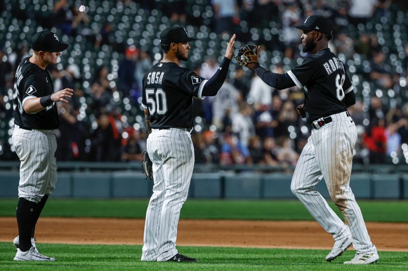 Aug 26, 2023; Chicago, Illinois, USA; Chicago White Sox players celebrate after defeating the Oakland Athletics at Guaranteed Rate Field. Mandatory Credit: Kamil Krzaczynski-USA TODAY Sports