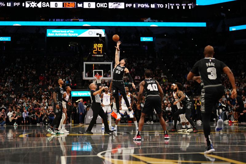 SAN ANTONIO, TX - NOVEMBER 19: Zach Collins #23 of the San Antonio Spurs takes tip off during the game against the Oklahoma City Thunder during the Emirates NBA Cup game on November 19, 2024 at the Frost Bank Center in San Antonio, Texas. NOTE TO USER: User expressly acknowledges and agrees that, by downloading and or using this photograph, user is consenting to the terms and conditions of the Getty Images License Agreement. Mandatory Copyright Notice: Copyright 2024 NBAE (Photos by Darren Carroll/NBAE via Getty Images)