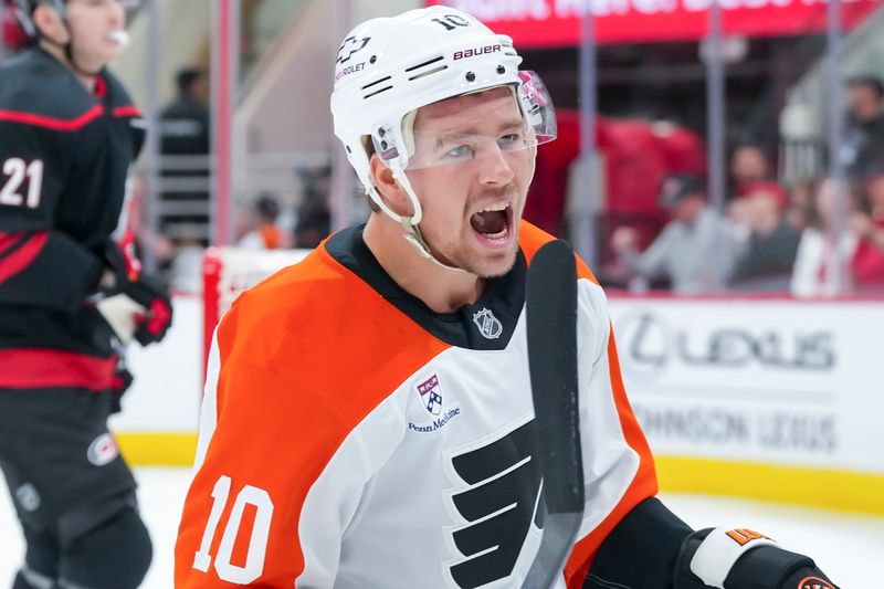Oct 11, 2025; Raleigh, North Carolina, USA;  Philadelphia Flyers right wing Bobby Brink (10) celebrates his goal against the Carolina Hurricanes during the second period at Lenovo Center. Mandatory Credit: James Guillory-Imagn Images