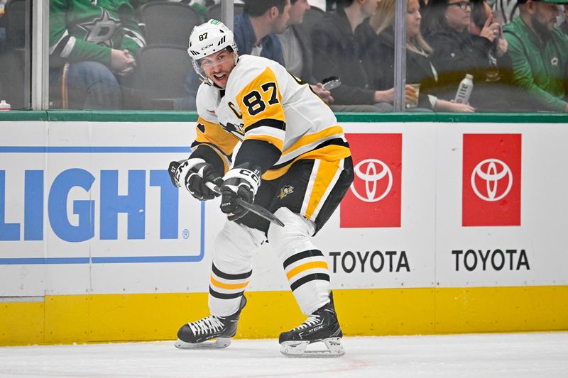 Mar 22, 2024; Dallas, Texas, USA; Pittsburgh Penguins center Sidney Crosby (87) passes the puck against the Dallas Stars during the first period at the American Airlines Center. Mandatory Credit: Jerome Miron-USA TODAY Sports