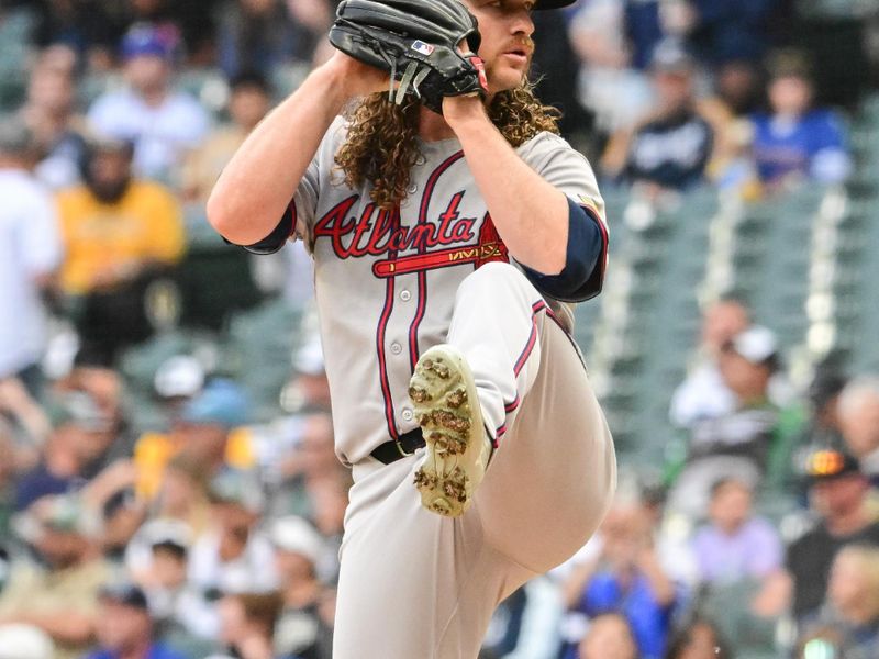 Jun 10, 2025; Milwaukee, Wisconsin, USA; Atlanta Braves starting pitcher Grant Holmes (66) throws a pitch in the first inning against the Milwaukee Brewers at American Family Field. Mandatory Credit: Benny Sieu-Imagn Images