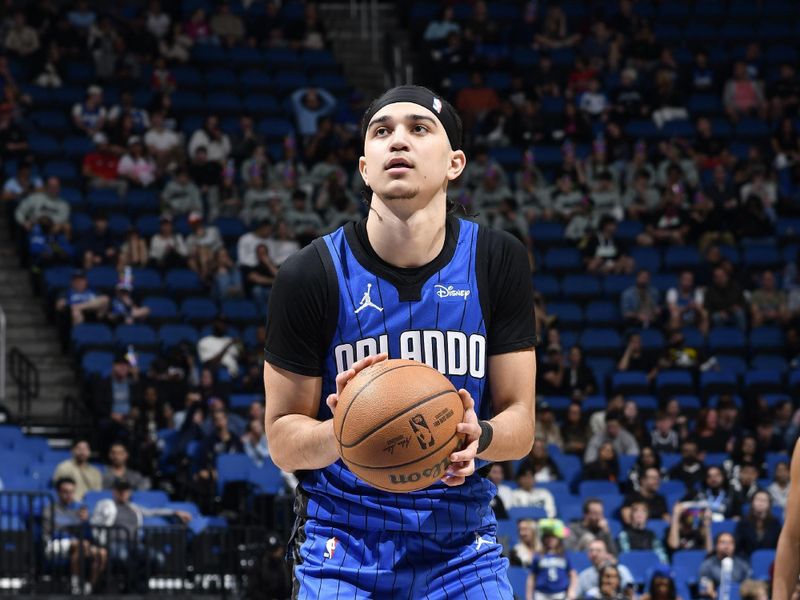 ORLANDO, FL - FEBRUARY 27: Anthony Black #0 of the Orlando Magic shoots a free throw during the game against the Brooklyn Nets on February 27, 2024 at the Kia Center in Orlando, Florida. NOTE TO USER: User expressly acknowledges and agrees that, by downloading and or using this photograph, User is consenting to the terms and conditions of the Getty Images License Agreement. Mandatory Copyright Notice: Copyright 2024 NBAE (Photo by Fernando Medina/NBAE via Getty Images)