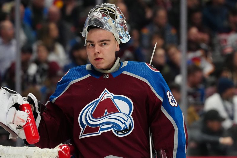 Apr 18, 2024; Denver, Colorado, USA; Colorado Avalanche goaltender Justus Annunen (60) during the first period against the Edmonton Oilers at Ball Arena. Mandatory Credit: Ron Chenoy-USA TODAY Sports