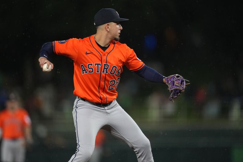 Sep 24, 2025; West Sacramento, California, USA; Houston Astros third baseman Ramon Urias (29) throws the ball to first to record an out against the Athletics in the seventh inning at Sutter Health Park. Mandatory Credit: Cary Edmondson-Imagn Images