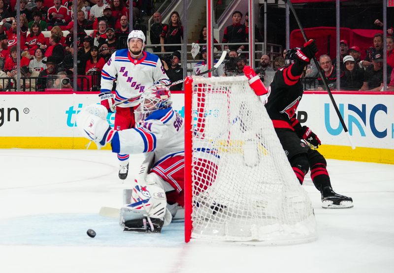 May 16, 2024; Raleigh, North Carolina, USA; Carolina Hurricanes center Martin Necas (88) celebrates after scoring a goal past New York Rangers goaltender Igor Shesterkin (31) during the first period in game six of the second round of the 2024 Stanley Cup Playoffs at PNC Arena. Mandatory Credit: James Guillory-USA TODAY Sports