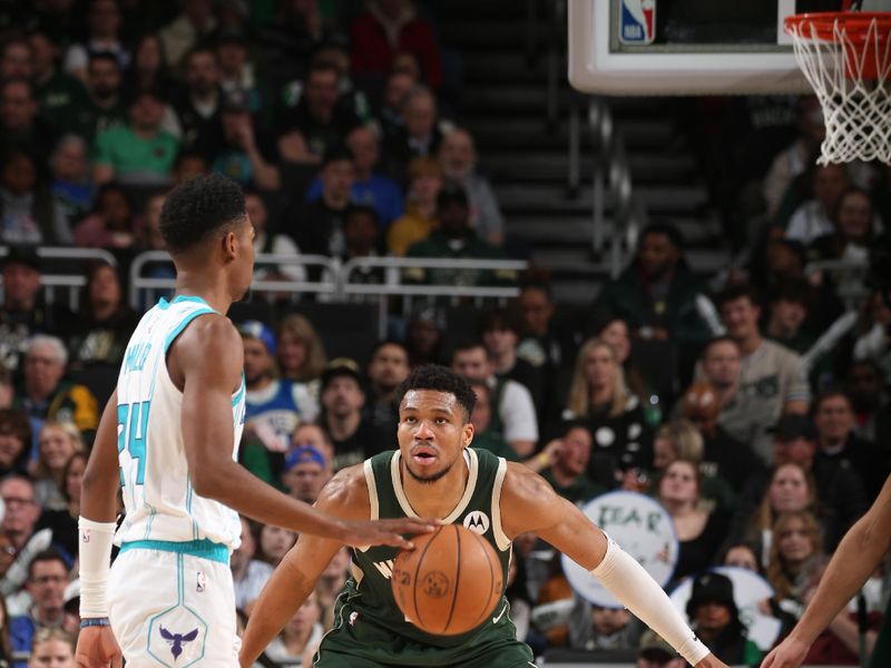 MILWAUKEE, WI - FEBRUARY 9: Giannis Antetokounmpo #34 of the Milwaukee Bucks plays defense during the game against the Charlotte Hornets on February 9, 2024 at the Fiserv Forum Center in Milwaukee, Wisconsin. NOTE TO USER: User expressly acknowledges and agrees that, by downloading and or using this Photograph, user is consenting to the terms and conditions of the Getty Images License Agreement. Mandatory Copyright Notice: Copyright 2024 NBAE (Photo by Gary Dineen/NBAE via Getty Images).