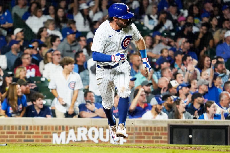 Sep 21, 2023; Chicago, Illinois, USA; Chicago Cubs shortstop Dansby Swanson (7) hits a one run single against the Pittsburgh Pirates during the seventh inning at Wrigley Field. Mandatory Credit: David Banks-USA TODAY Sports