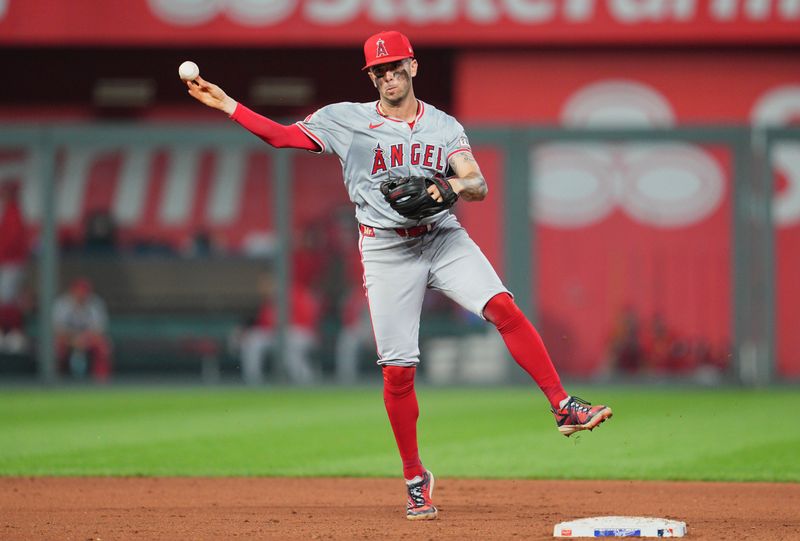 Aug 21, 2024; Kansas City, Missouri, USA; Los Angeles Angels shortstop Zach Neto (9) throws to first base during the fourth inning against the Kansas City Royals at Kauffman Stadium. Mandatory Credit: Jay Biggerstaff-USA TODAY Sports