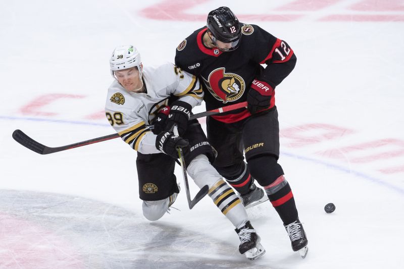 Jan 25, 2024; Ottawa, Ontario, CAN; Boston Bruins center Morgan Geekie (39) battles with  Ottawa Senators center Mark Kastelic (12) in the third period at the Canadian Tire Centre. Mandatory Credit: Marc DesRosiers-USA TODAY Sports