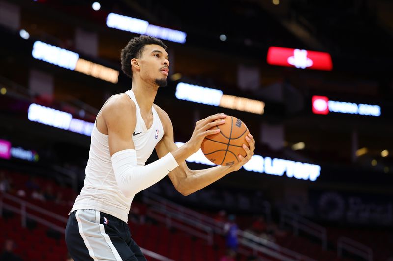 HOUSTON, TEXAS - OCTOBER 17: Victor Wembanyama #1 of the San Antonio Spurs warms up before a preseason game against the Houston Rockets at Toyota Center on October 17, 2024 in Houston, Texas. NOTE TO USER: User expressly acknowledges and agrees that, by downloading and or using this photograph, User is consenting to the terms and conditions of the Getty Images License Agreement. (Photo by Alex Slitz/Getty Images)