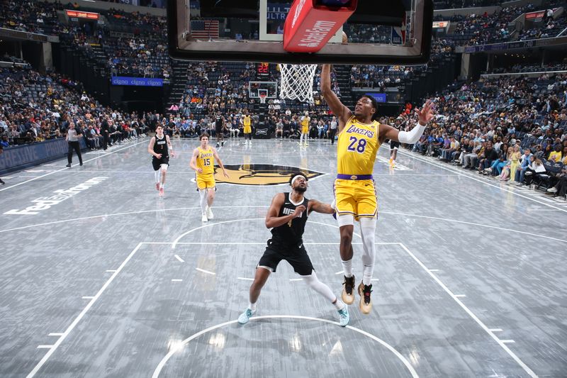 MEMPHIS, TN - APRIL 12: Rui Hachimura #28 of the Los Angeles Lakers drives to the basket during the game against the Memphis Grizzlies on April 12, 2024 at FedExForum in Memphis, Tennessee. NOTE TO USER: User expressly acknowledges and agrees that, by downloading and or using this photograph, User is consenting to the terms and conditions of the Getty Images License Agreement. Mandatory Copyright Notice: Copyright 2024 NBAE (Photo by Joe Murphy/NBAE via Getty Images)