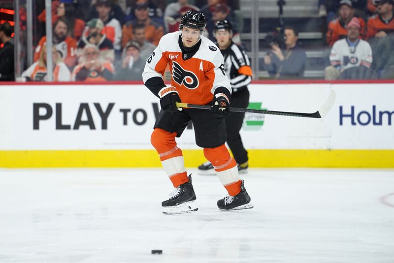 Nov 1, 2025; Philadelphia, Pennsylvania, USA; Philadelphia Flyers defenseman Travis Sanheim (6) passes the puck against the Toronto Maple Leafs in the first period at Xfinity Mobile Arena. Mandatory Credit: Kyle Ross-Imagn Images