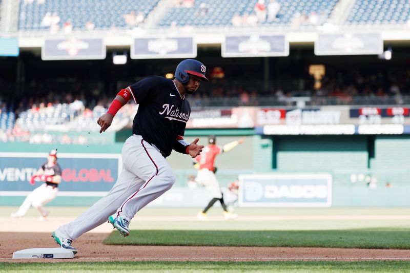 Jun 19, 2024; Washington, District of Columbia, USA; Washington Nationals catcher Keibert Ruiz (20) rounds third base en route to scoring a run against the Arizona Diamondbacks on an RBI single by Nationals pinch hitter Ildemaro Vargas (not pictured) during the seventh inning at Nationals Park. Mandatory Credit: Geoff Burke-USA TODAY Sports