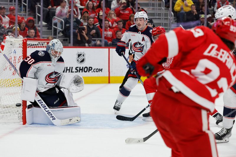 Nov 11, 2023; Detroit, Michigan, USA;  Columbus Blue Jackets goaltender Spencer Martin (30) makes a save against the Detroit Red Wings in the second period at Little Caesars Arena. Mandatory Credit: Rick Osentoski-USA TODAY Sports