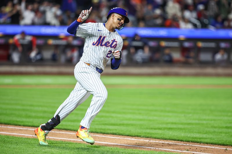 Sep 3, 2024; New York City, New York, USA;  New York Mets third baseman Mark Vientos (27) hits a solo home run in the seventh inning against the Boston Red Sox at Citi Field. Mandatory Credit: Wendell Cruz-Imagn Images