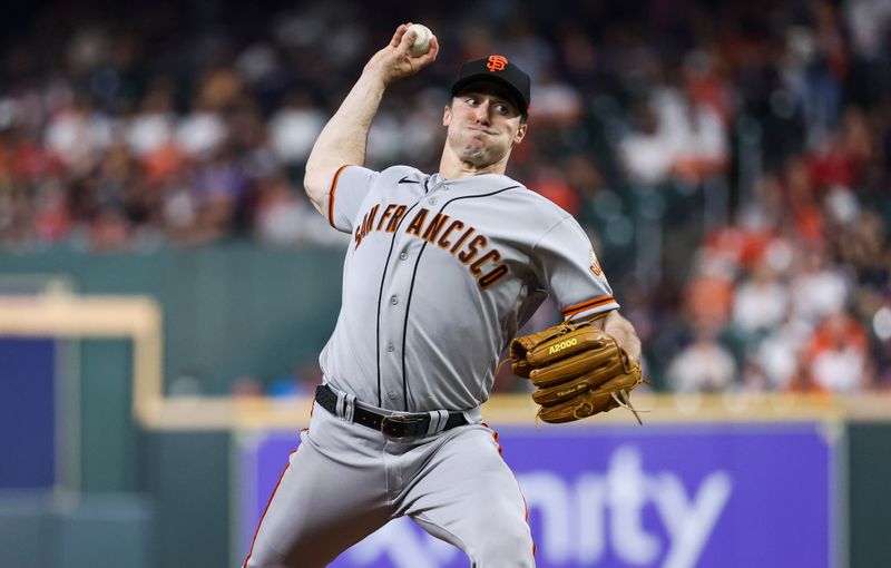 May 1, 2023; Houston, Texas, USA; San Francisco Giants starting pitcher Ross Stripling (48) delivers a pitch during the second inning against the Houston Astros at Minute Maid Park. Mandatory Credit: Troy Taormina-USA TODAY Sports