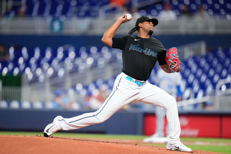 Jun 7, 2023; Miami, Florida, USA; Miami Marlins starting pitcher Edward Cabrera (27) throws a pitch against the Kansas City Royals during the first inning at loanDepot Park. Mandatory Credit: Rich Storry-USA TODAY Sports