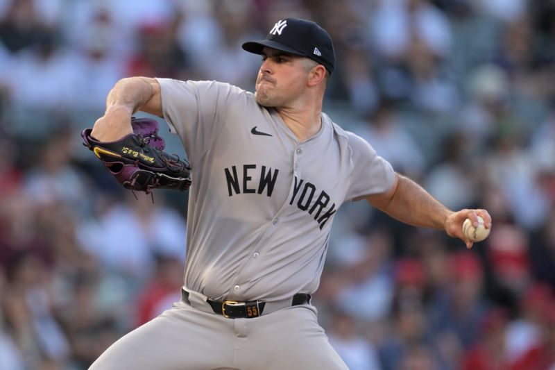 May 30, 2024; Anaheim, California, USA;  New York Yankees starting pitcher Carlos Rodon (55) delivers to the plate in the first inning against the Los Angeles Angels at Angel Stadium. Mandatory Credit: Jayne Kamin-Oncea-USA TODAY Sports