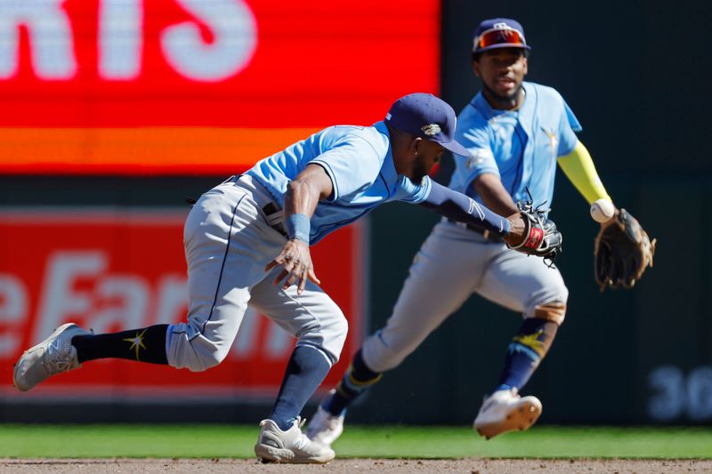 Sep 13, 2023; Minneapolis, Minnesota, USA; Tampa Bay Rays second baseman Vidal Brujan (7) commits an error on ball hit by Minnesota Twins first baseman Donovan Solano (not pictured) in the eighth inning at Target Field. Mandatory Credit: Bruce Kluckhohn-USA TODAY Sports