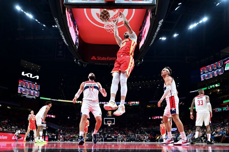 ATLANTA, GA - OCTOBER 28:  Larry Nance Jr. #22 of the Atlanta Hawks dunks the ball during the game on October 28, 2024 at State Farm Arena in Atlanta, Georgia.  NOTE TO USER: User expressly acknowledges and agrees that, by downloading and/or using this Photograph, user is consenting to the terms and conditions of the Getty Images License Agreement. Mandatory Copyright Notice: Copyright 2024 NBAE (Photo by Adam Hagy/NBAE via Getty Images)