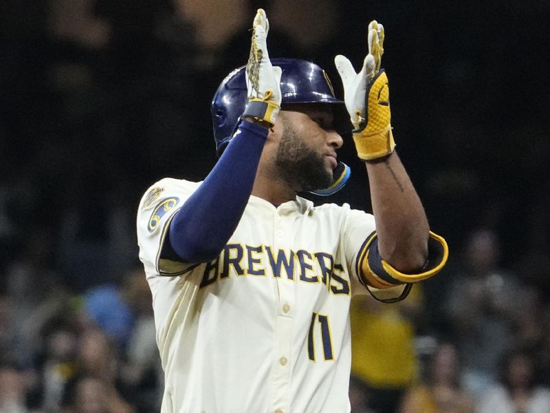 Sep 18, 2025; Milwaukee, Wisconsin, USA; Milwaukee Brewers outfielder Jackson Chourio (11) hits a double against the Los Angeles Angels in the seventh inning at American Family Field. Mandatory Credit: Michael McLoone-Imagn Images
