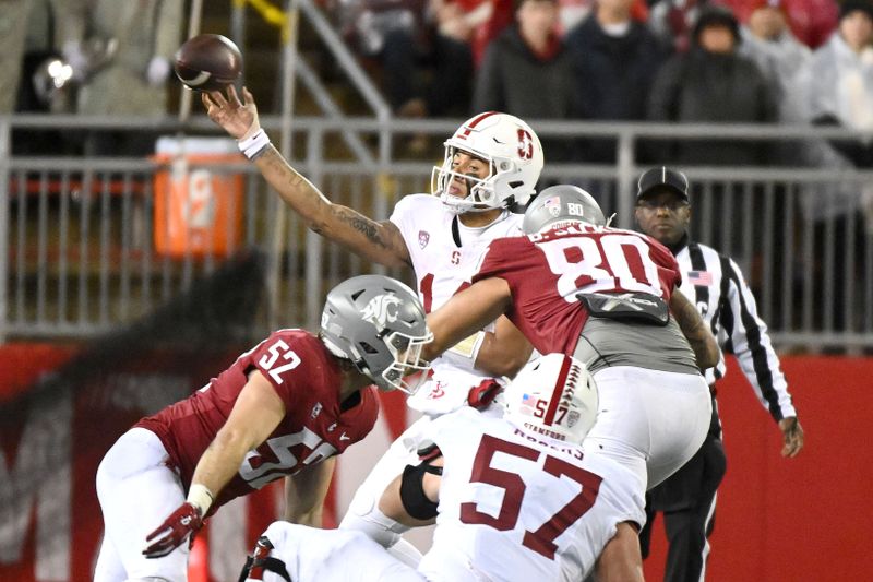 Nov 4, 2023; Pullman, Washington, USA; Stanford Cardinal quarterback Ashton Daniels (14) throws a pass against Washington State Cougars defensive end Brennan Jackson (80) in the second half at Gesa Field at Martin Stadium. Stanford won 10-7. Mandatory Credit: James Snook-USA TODAY Sports