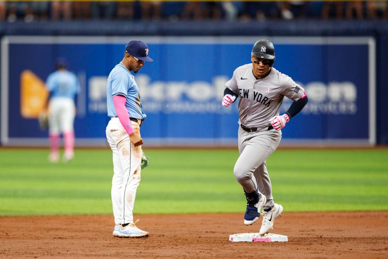 May 12, 2024; St. Petersburg, Florida, USA;  New York Yankees outfielder Jahmai Jones (14) runs the bases after hitting a solo home run against the Tampa Bay Rays in the third inning at Tropicana Field. Mandatory Credit: Nathan Ray Seebeck-USA TODAY Sports