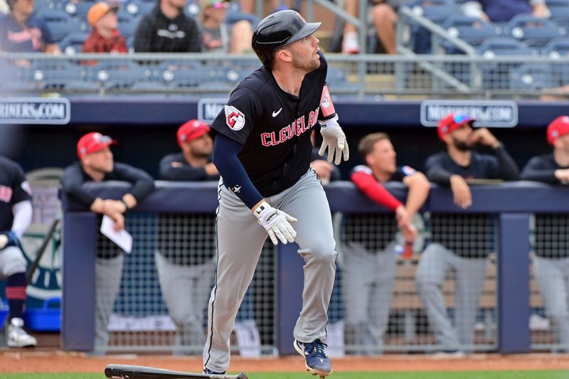 Feb 26, 2024; Peoria, Arizona, USA;  Cleveland Guardians right fielder Chase DeLauter (6) hits a two run home run in the second inning against the San Diego Padres during a spring training game at Peoria Sports Complex. Mandatory Credit: Matt Kartozian-USA TODAY Sports