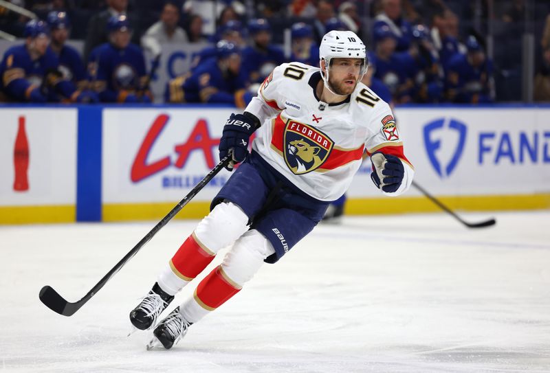 Oct 28, 2024; Buffalo, New York, USA;  Florida Panthers left wing A.J. Greer (10) looks for the puck during the first period against the Buffalo Sabres at KeyBank Center. Mandatory Credit: Timothy T. Ludwig-Imagn Images