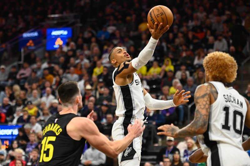 SALT LAKE CITY, UTAH - OCTOBER 31: Keldon Johnson #0 of the San Antonio Spurs shoots during the second half of a game against the Utah Jazz at Delta Center on October 31, 2024 in Salt Lake City, Utah. NOTE TO USER: User expressly acknowledges and agrees that, by downloading and or using this photograph, User is consenting to the terms and conditions of the Getty Images License Agreement. (Photo by Alex Goodlett/Getty Images)