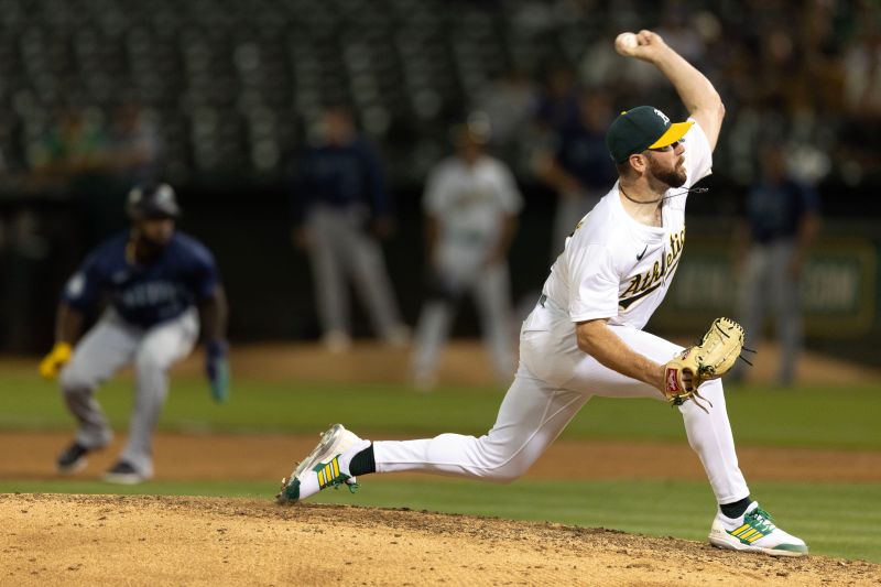 Sep 3, 2024; Oakland, California, USA; Oakland Athletics pitcher Hogan Harris (63) delivers a pitch against the Seattle Mariners during the ninth inning at Oakland-Alameda County Coliseum. Mandatory Credit: D. Ross Cameron-Imagn Images