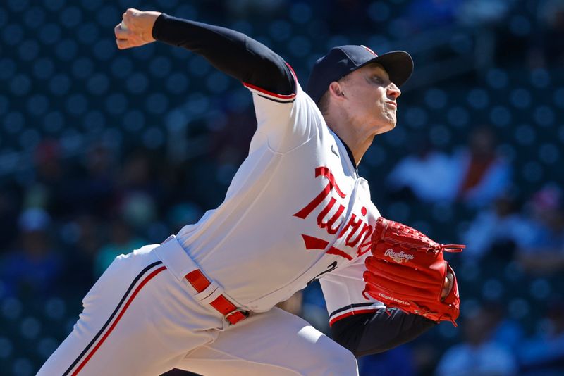 Sep 13, 2023; Minneapolis, Minnesota, USA; Minnesota Twins relief pitcher Griffin Jax (22) throws to the Tampa Bay Rays in the ninth inning at Target Field. Mandatory Credit: Bruce Kluckhohn-USA TODAY Sports